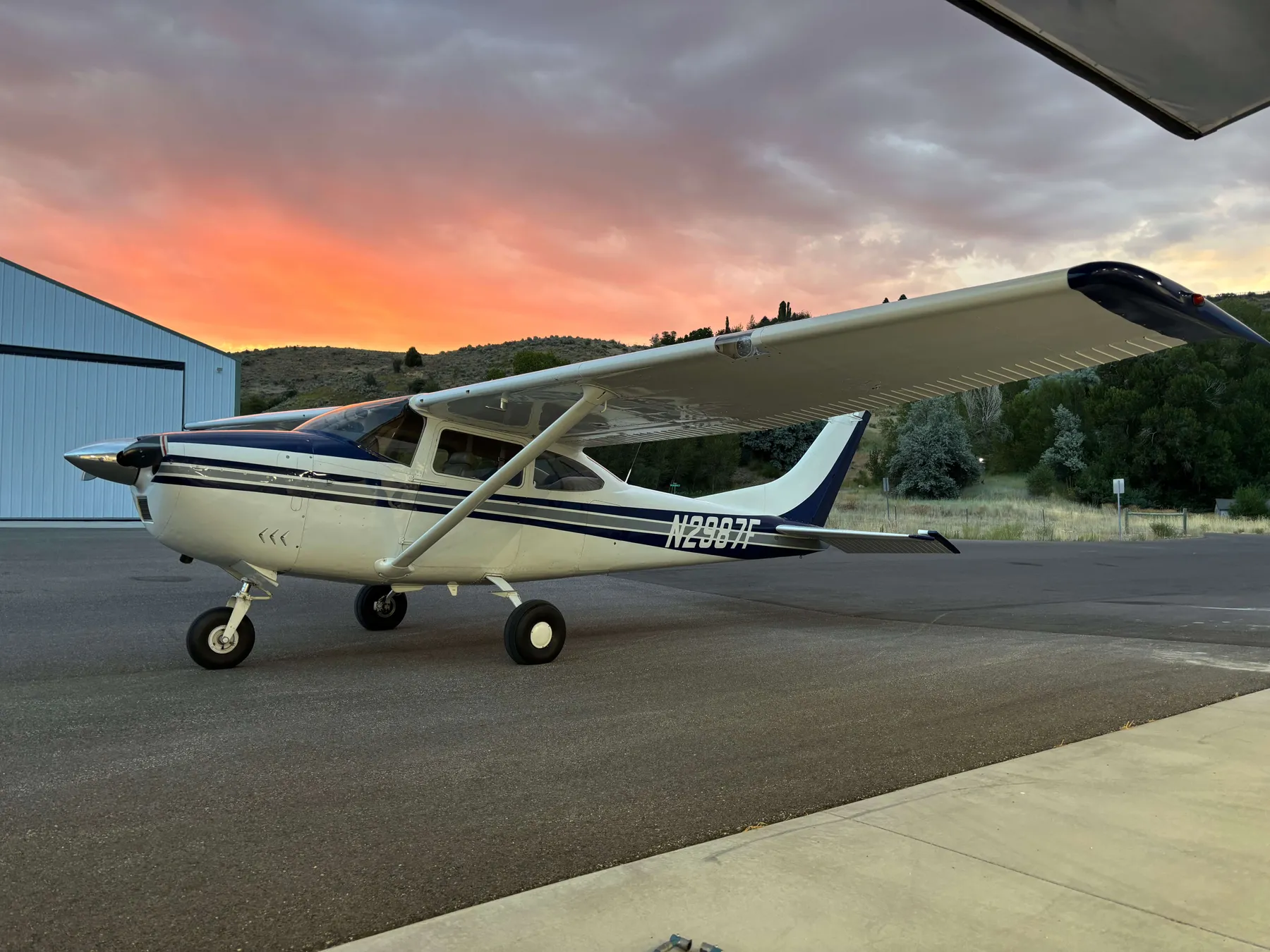 N2987F parked at Morgan County Airport beneath a vivid Utah sunrise